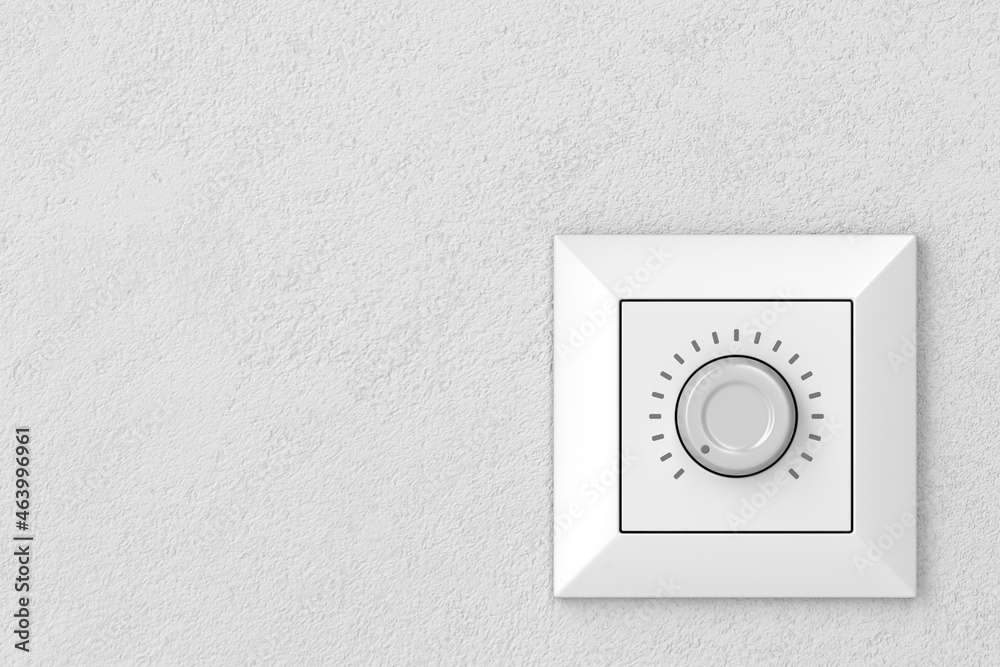 Dimmer light switch on a wall