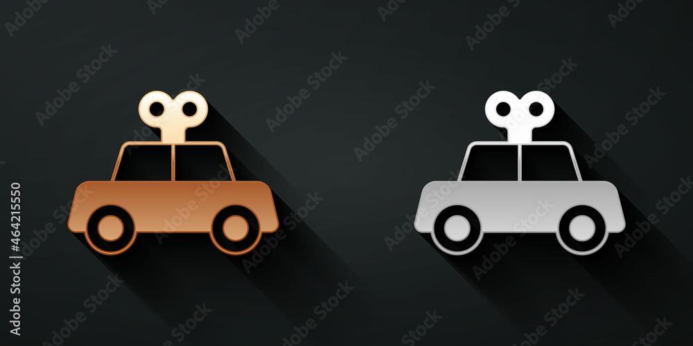 Gold and silver Toy car icon isolated on black background. Long shadow style. Vector