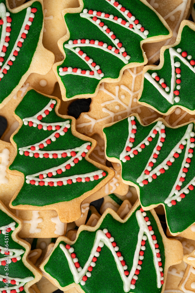 Top view of decorated Christmas tree cookie.