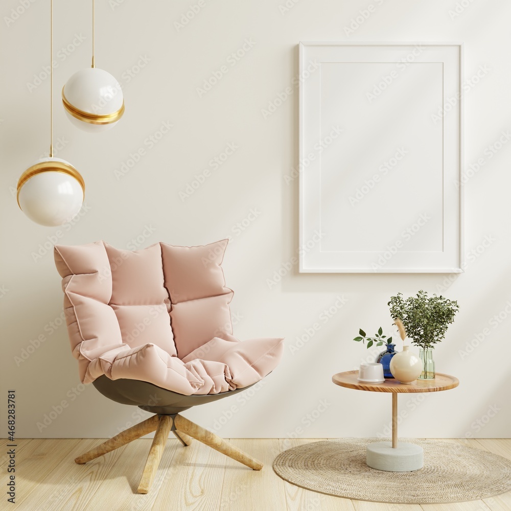 客厅室内白色空墙上带有垂直框架的海报模型，带有粉色天鹅绒扶手