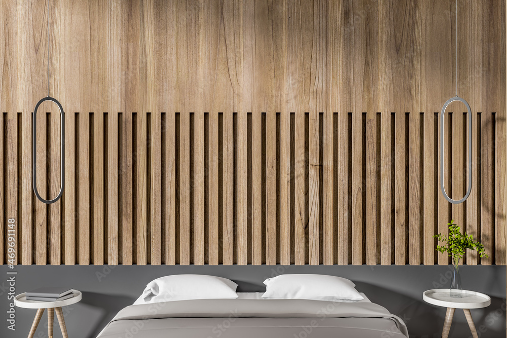 Modern wooden bedroom interior with close up of bed, decorative wall and other items. Design and hom