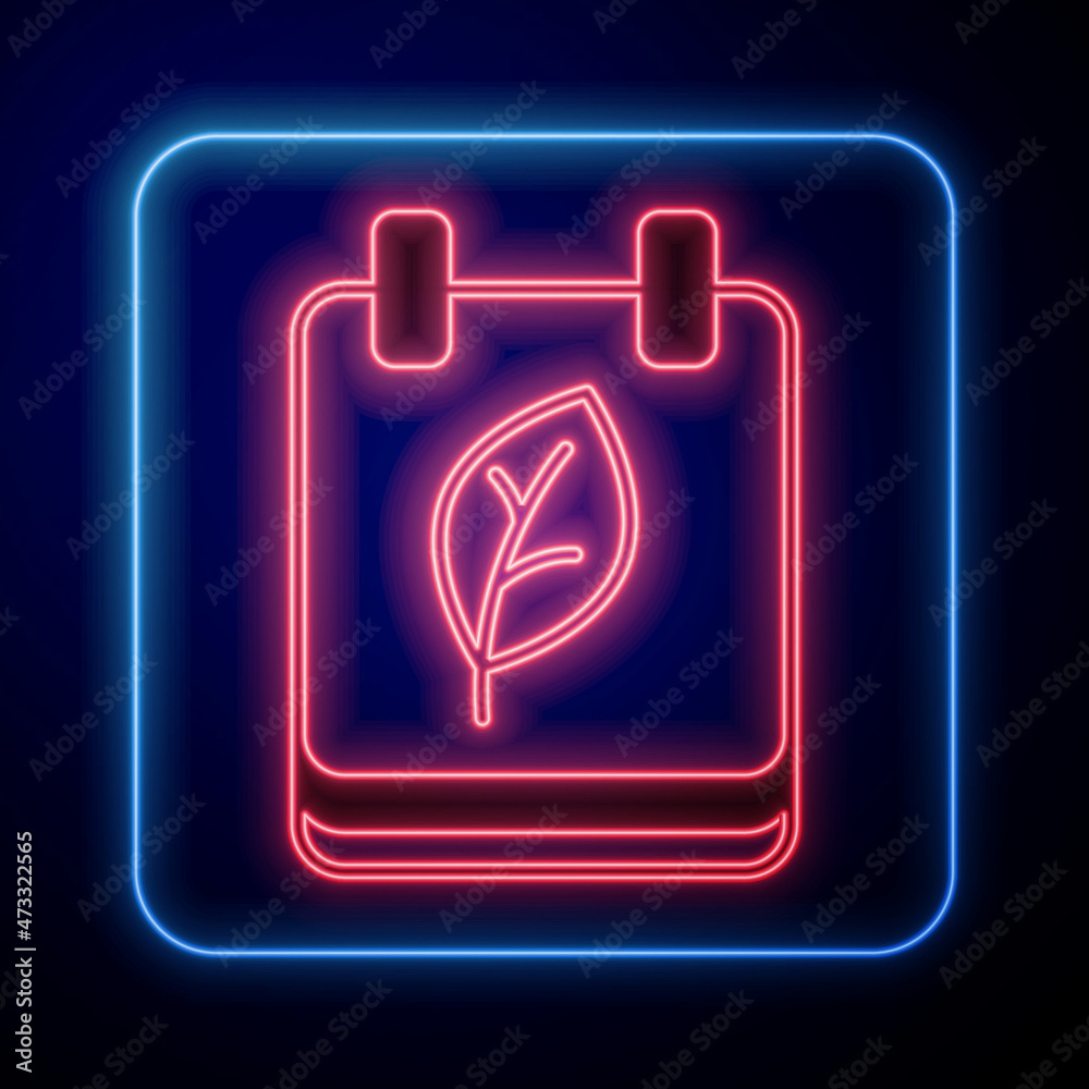 Glowing neon Calendar with autumn leaves icon isolated on black background. Vector
