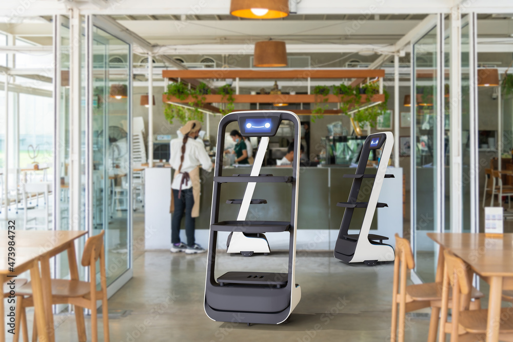 自动服务员机器人在餐厅工作，人工智能5G技术概念