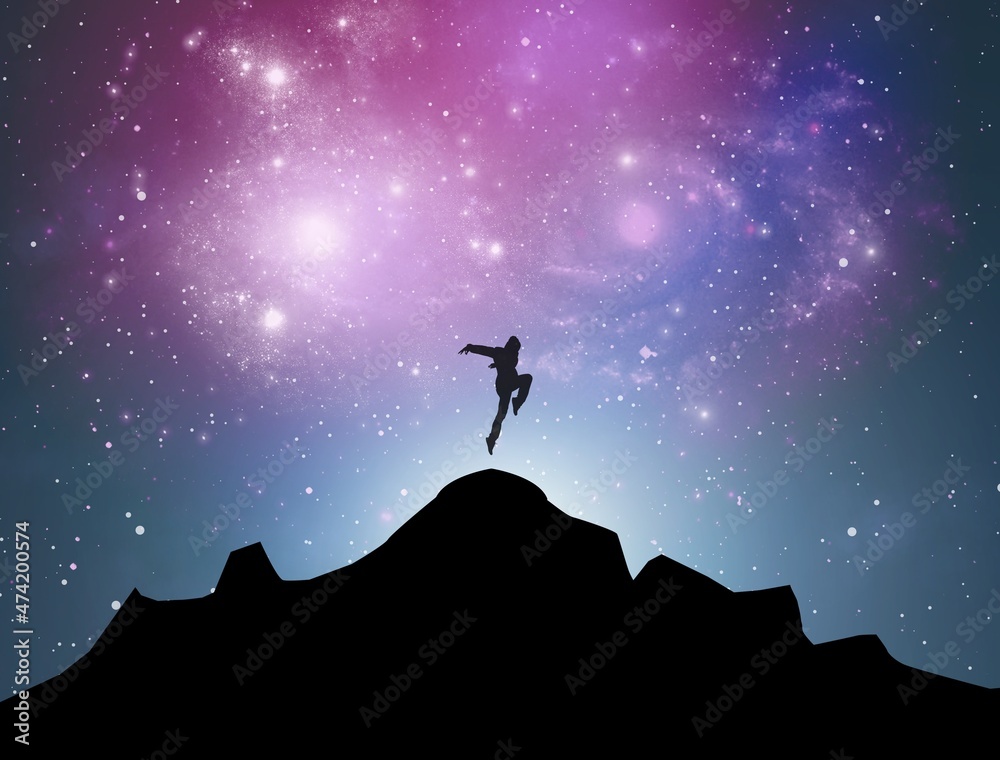 星夜的银河和山顶上的人。孤独的人的剪影
