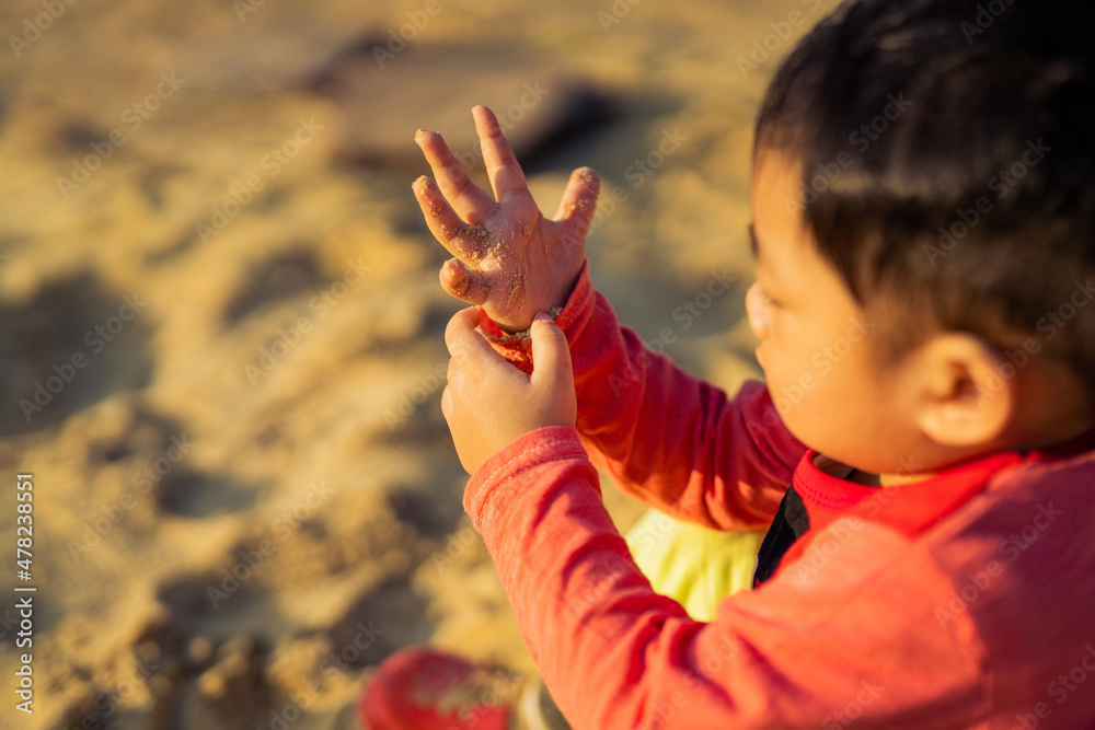 Young children asian sand play outdoor