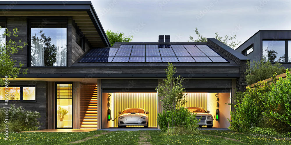 带太阳能电池板和电动汽车的现代住宅的夜景