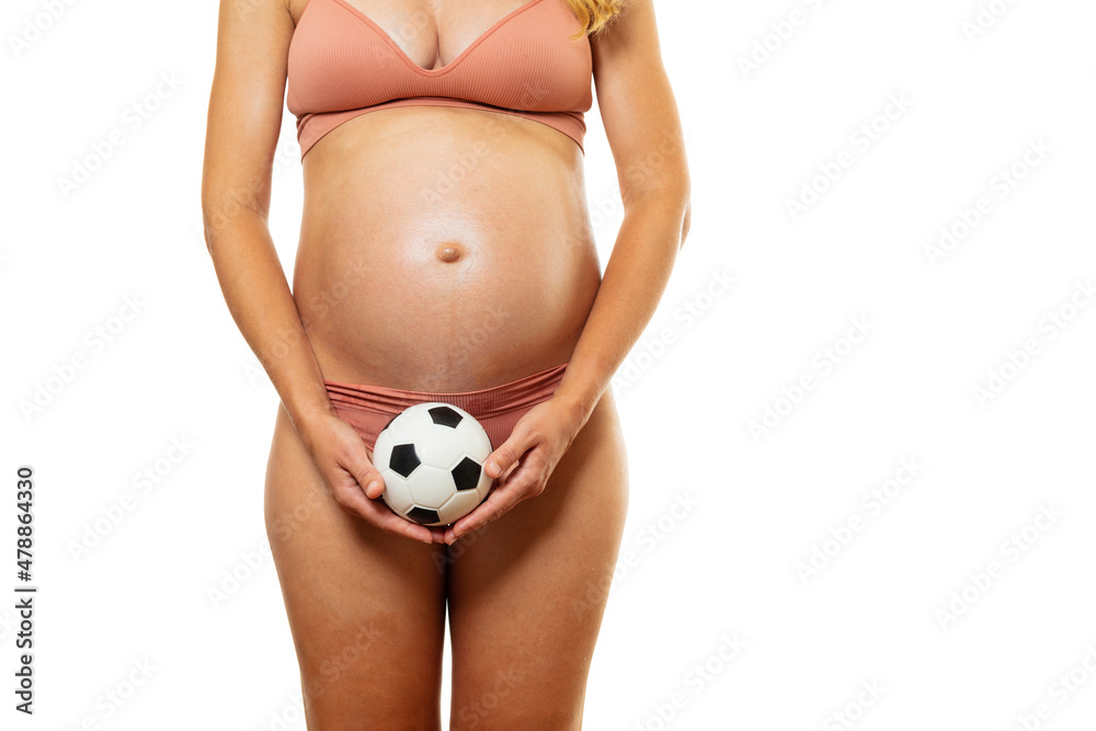 Expecting a boy concept - pregnant woman with ball