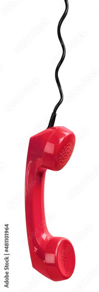 Answering an old fashioned red telephone handset