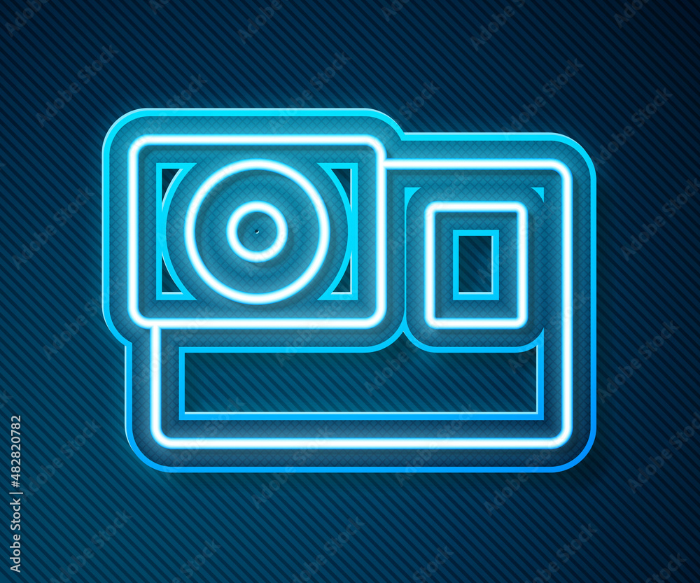 Glowing neon line Action extreme camera icon isolated on blue background. Video camera equipment for