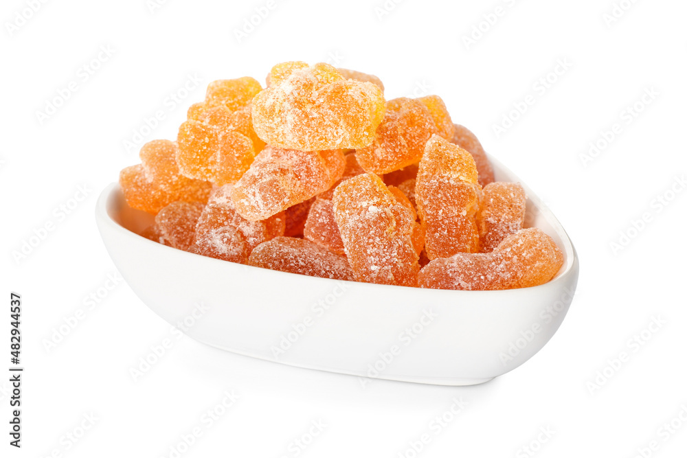 Bowl with different jelly bears on white background