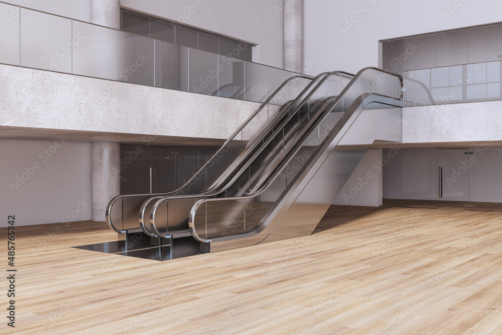 现代木制和混凝土空购物中心内部，带自动扶梯。大型公共内部