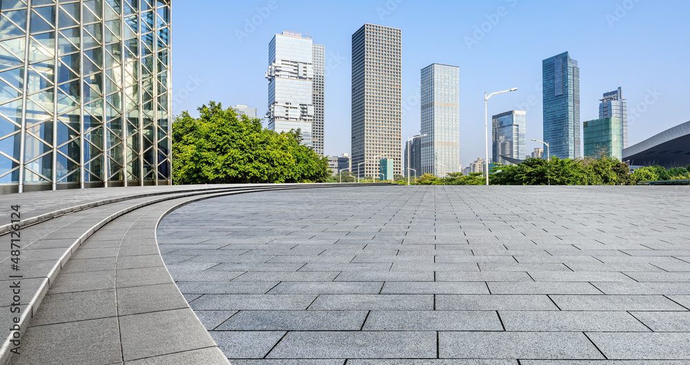 Panoramic skyline and modern commercial buildings with empty floors at Shenzhen, China. empty square