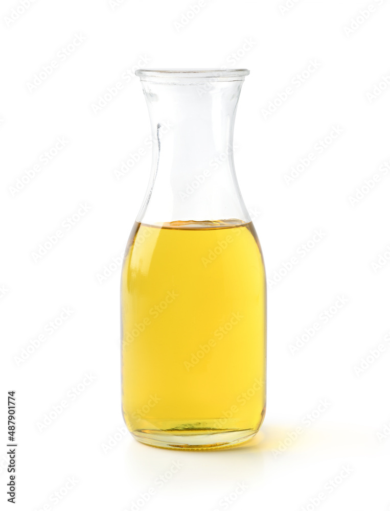 Cooking oil in glass bottle isolated on white background. Clipping path.