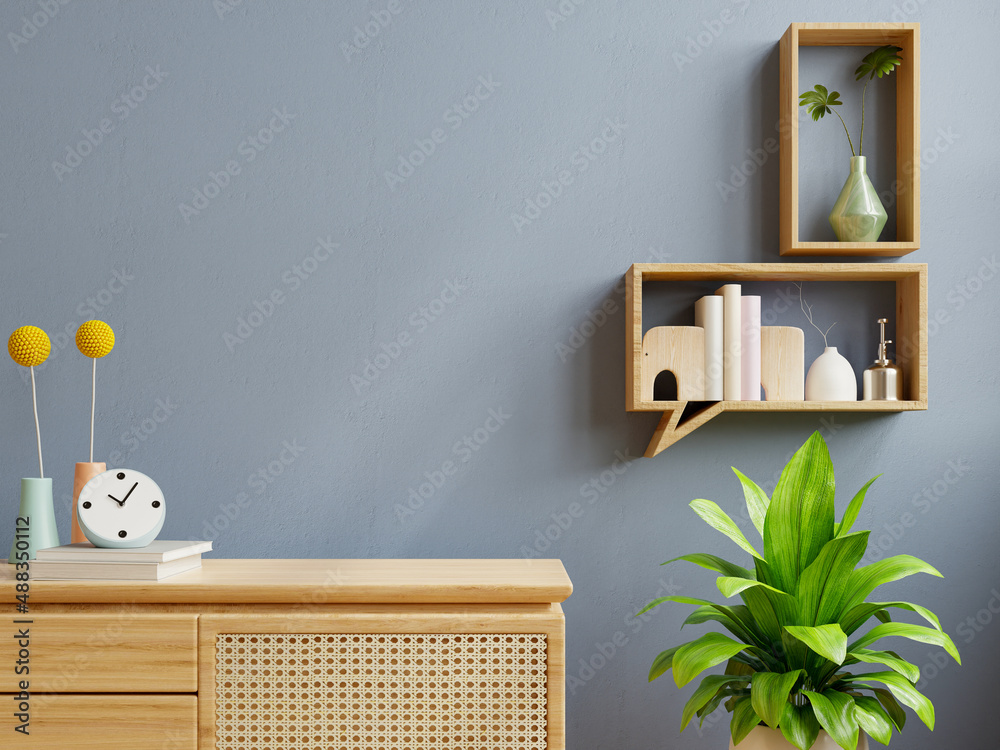 Interior wall mockup with green plant,dark blue wall and shelf.