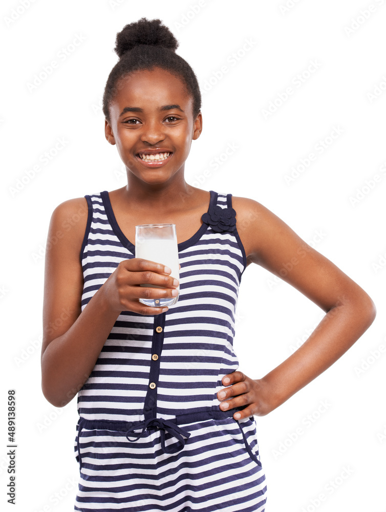 Milk is going to help me grow tall. Studio portrait of a young african american girl drinking a glas
