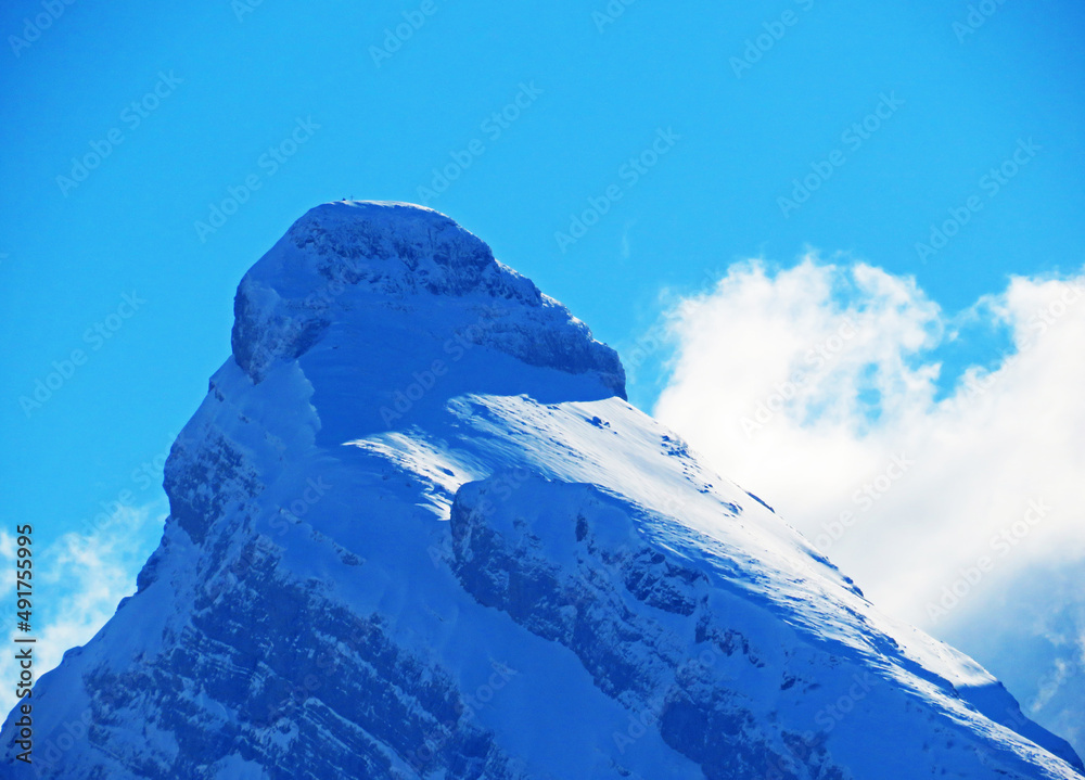 Snow-capped alpine peak Zuestoll (2234 m) in the Churfirsten mountain range, between the Toggenburg 