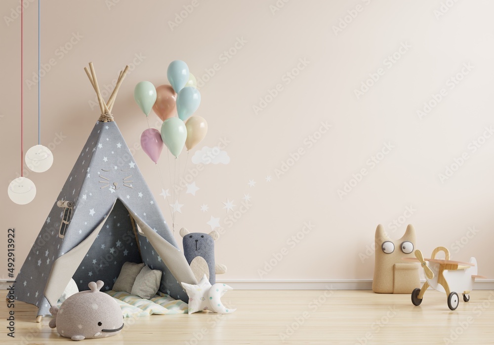 儿童房的模型墙，以浅粉色墙为背景的儿童帐篷。
