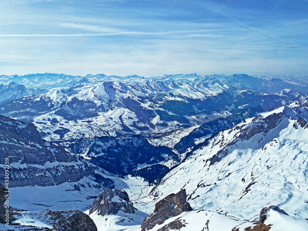 View of the snowy alpine peaks from Säntis, the highest peak of the Alpstein mountain range in the S