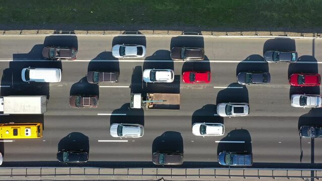 Aerial top view of cars on highway, city traffic jam, 4k