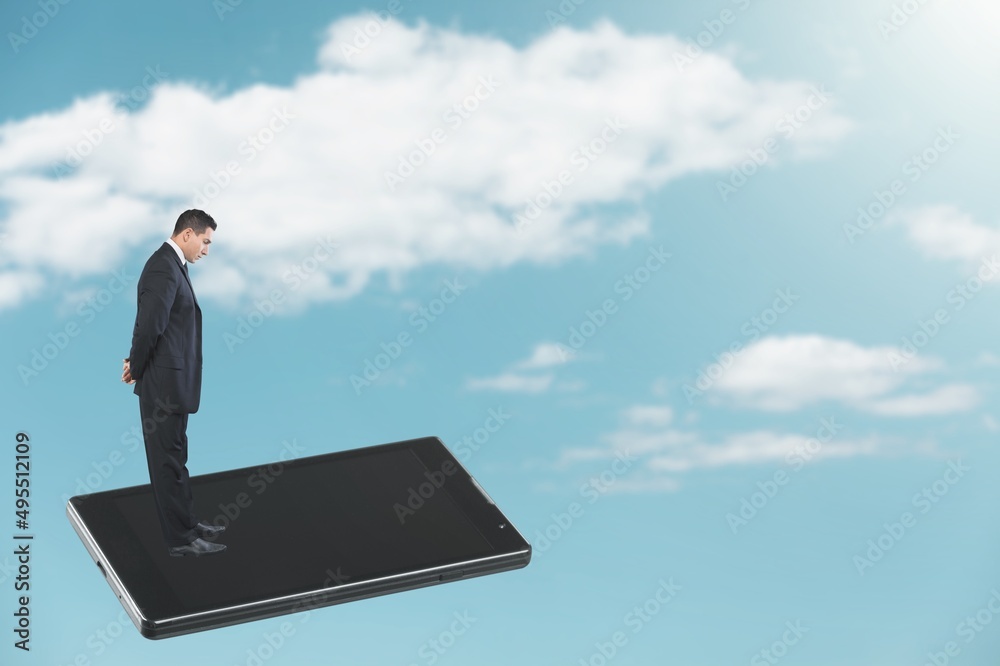 Businessman Standing on Flying Smartphone Using Mobile Phone in the Sky. User Experiences for Mobile