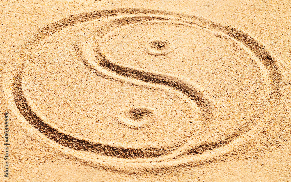 平衡是可以实现的。用沙子画出阴阳符号。