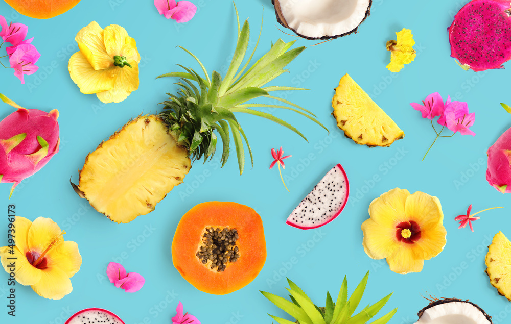 热带水果和花卉的创意布局。平面布局。食品概念。宏观概念。菠萝