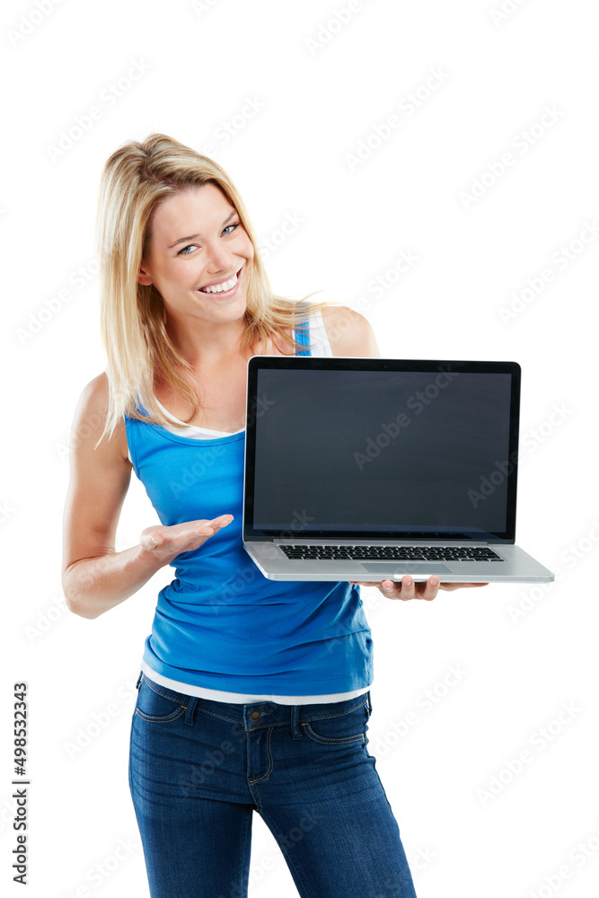 Everything you need is just a click away. Shot of a young woman holding a laptop against a white bac