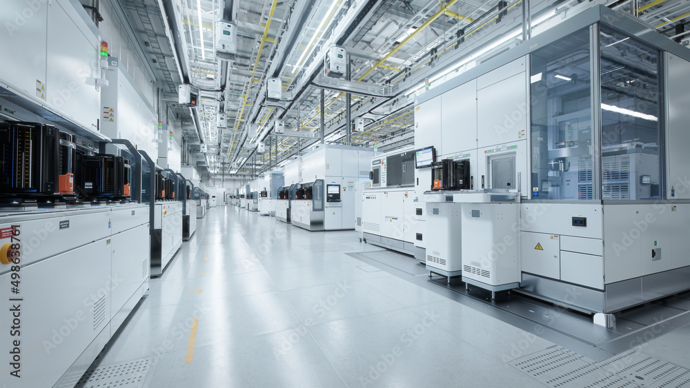 Wide Shot of Bright Advanced Semiconductor Production Fab Cleanroom with Working Overhead Wafer Tran