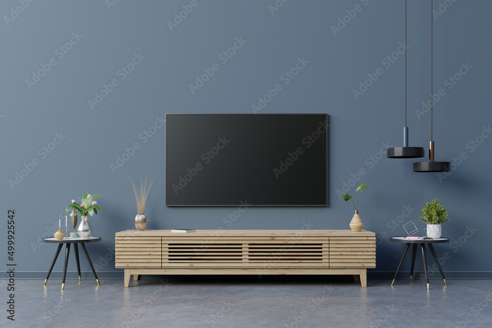 客厅深蓝色墙上的LED电视，简约设计。
