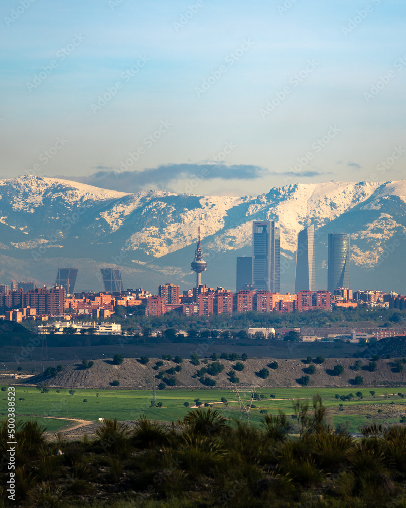 Madrid Skyline and the Sierra covered in Snow, Vertical photo