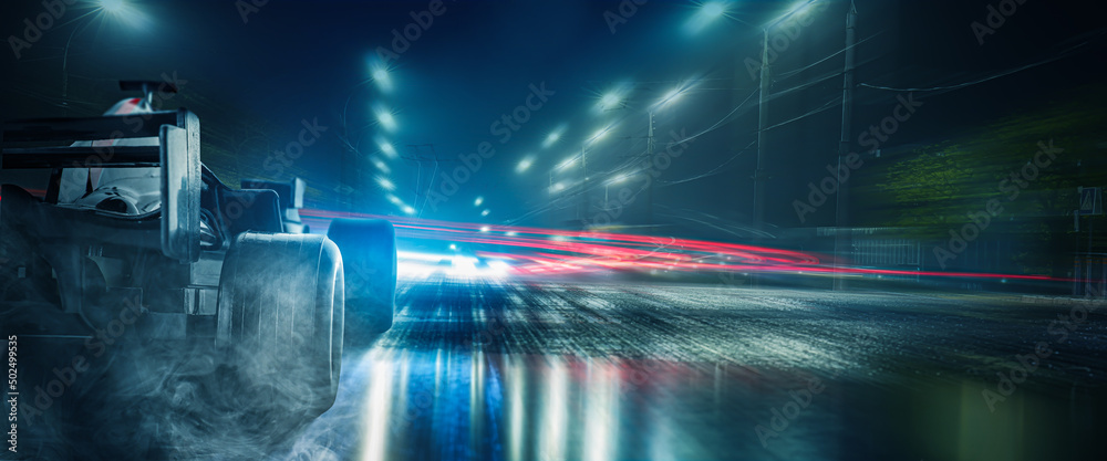 夜间城市街道上的现代快速赛车