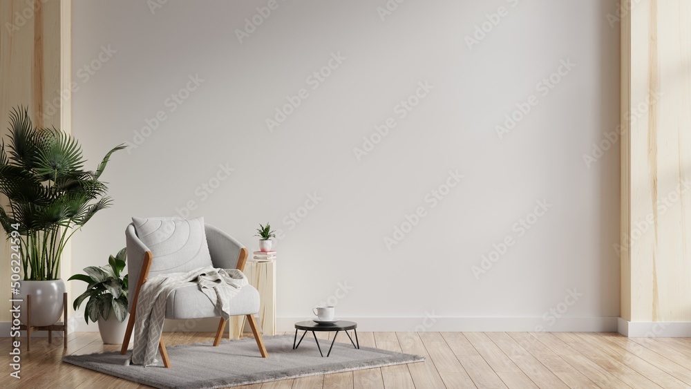 现代极简主义室内，灰色扶手椅，空荡荡的白墙背景。
