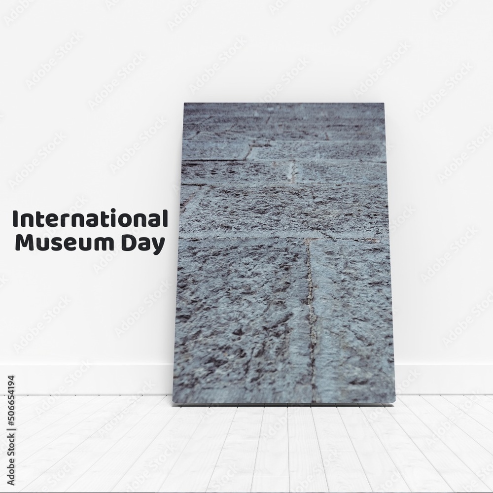 白墙上的灰色瓷砖和国际博物馆日文本的合成图像，复制速度