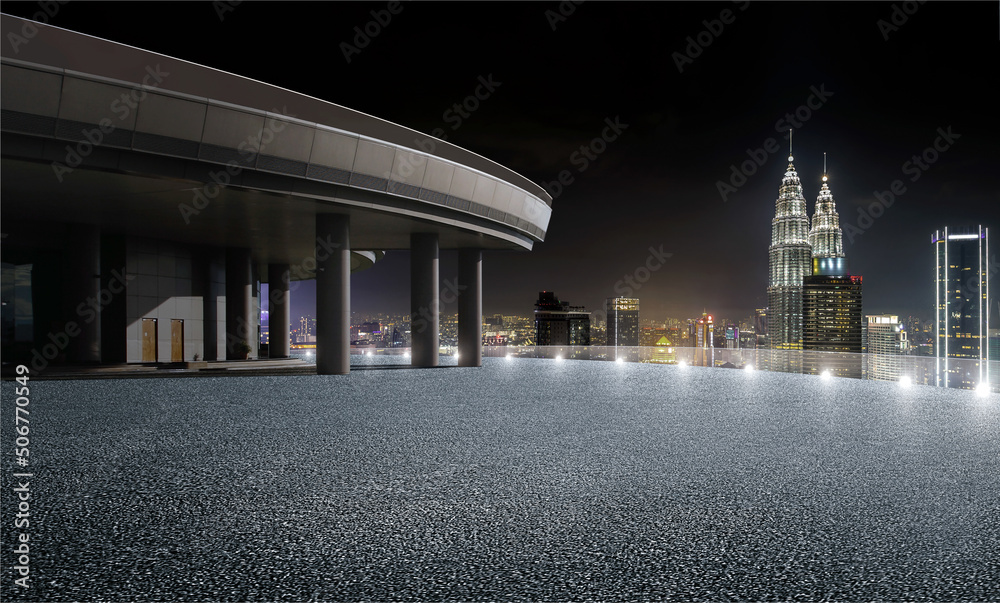 屋顶视图城市景观天际线夜景，前面是空的沥青地板。3D渲染