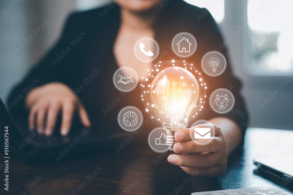 thinking and creative concept, Close up the light bulb and woman working on the desk, Creativity, an