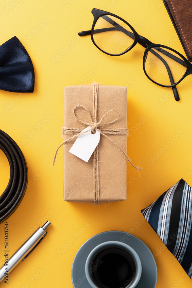 Fathers day gift idea design concept with gift box on yellow background.