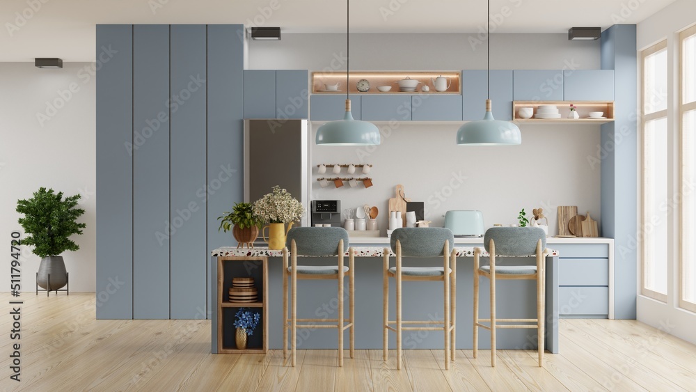 带家具的现代蓝色厨房内部，带白墙的厨房内部。