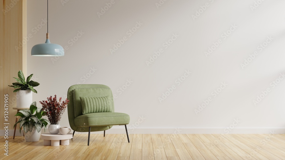 白色极简主义室内客厅有一把绿色扶手椅，背景是白色的空墙。