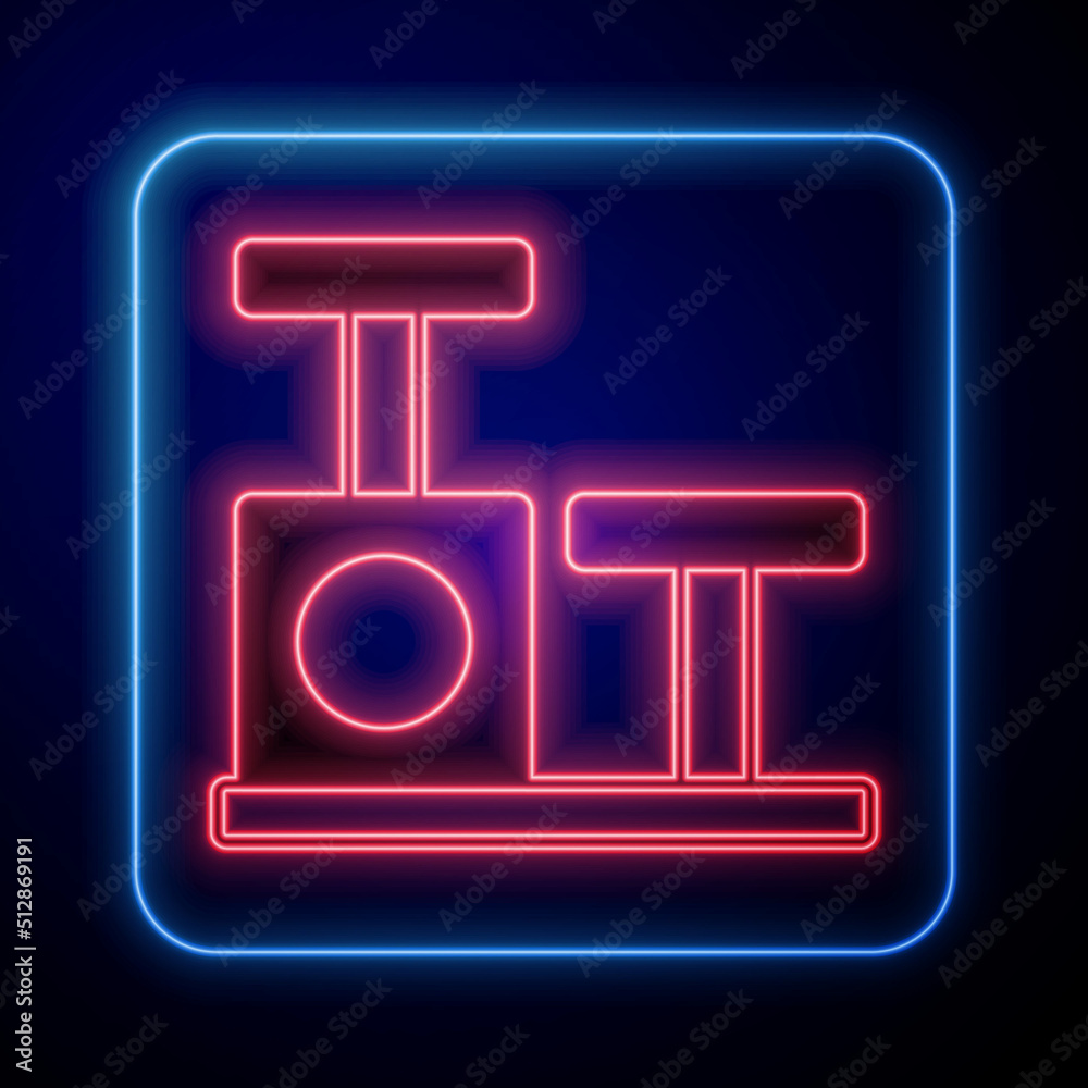 Glowing neon Cat scratching post with toy icon isolated on black background. Vector