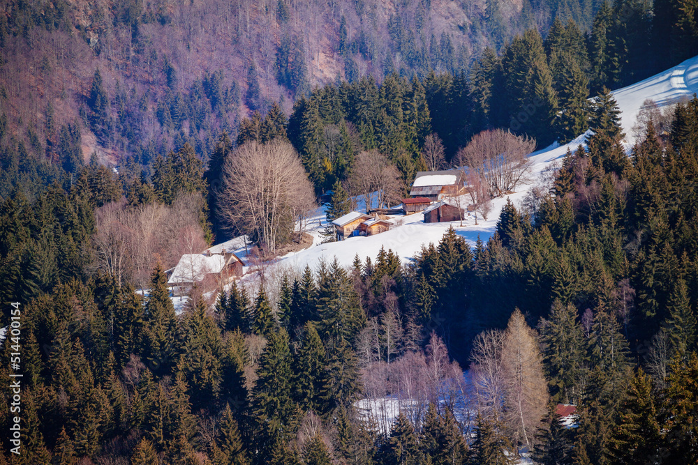 French mountain landscape many chalets on Alps slope at winter