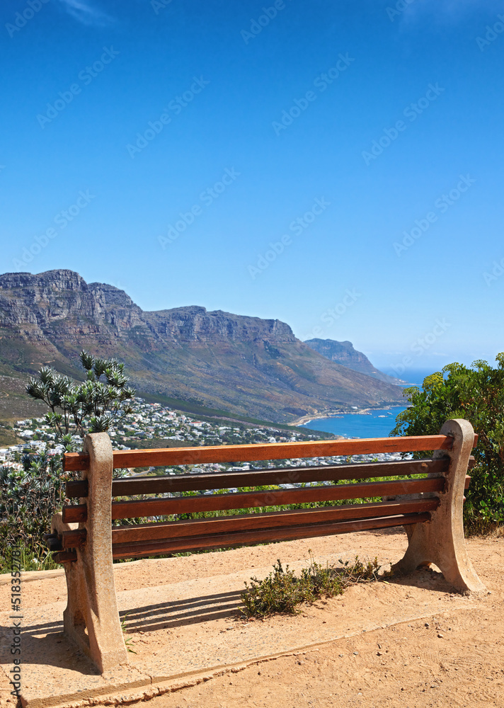 Bench with a relaxing view from Table Mountain, Cape Town, South Africa, soothing scene of Lions hea