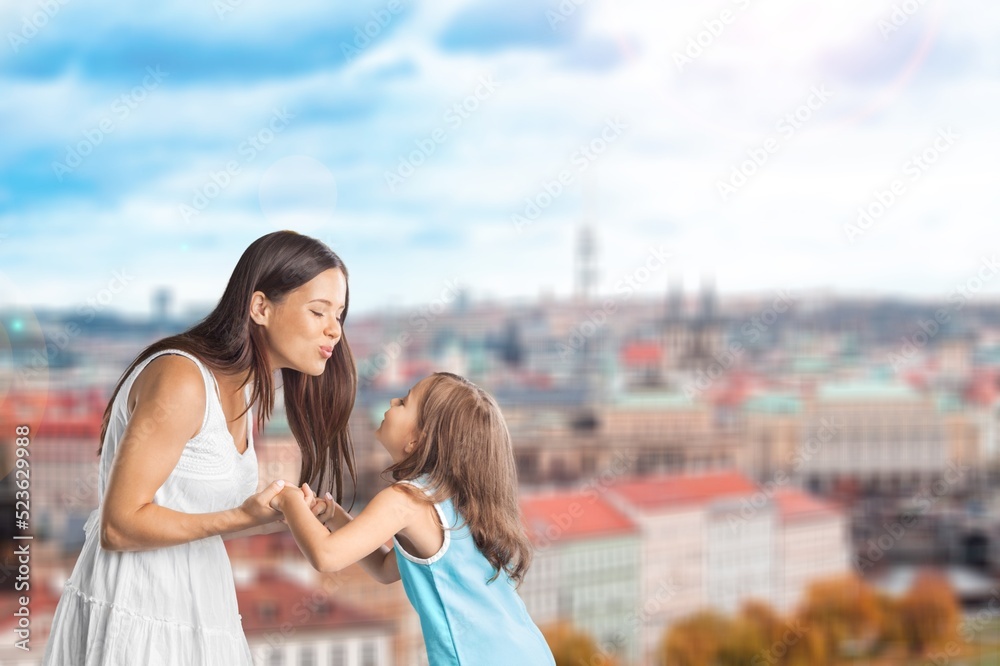A tourist woman on family holidays look at the beautiful cityscape