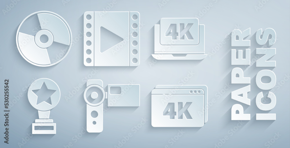设置影院摄像机，带4k视频的笔记本电脑，电影奖杯，在线播放，播放视频和CD或DVD光盘ic
