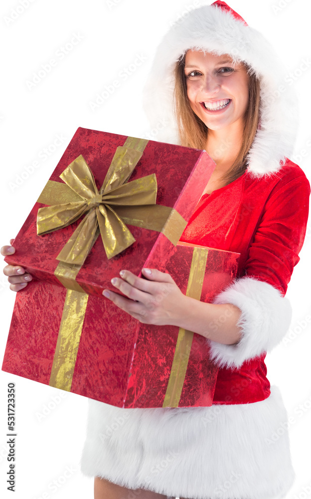 身穿圣诞老人服装、面带微笑的高加索妇女拿着打开的大圣诞礼盒的垂直图像