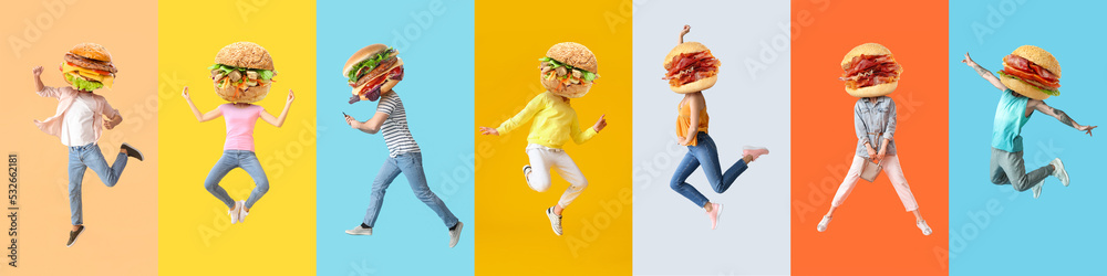 一群跳起来的人，他们拿着美味的汉堡，而不是他们的头放在五颜六色的背景上