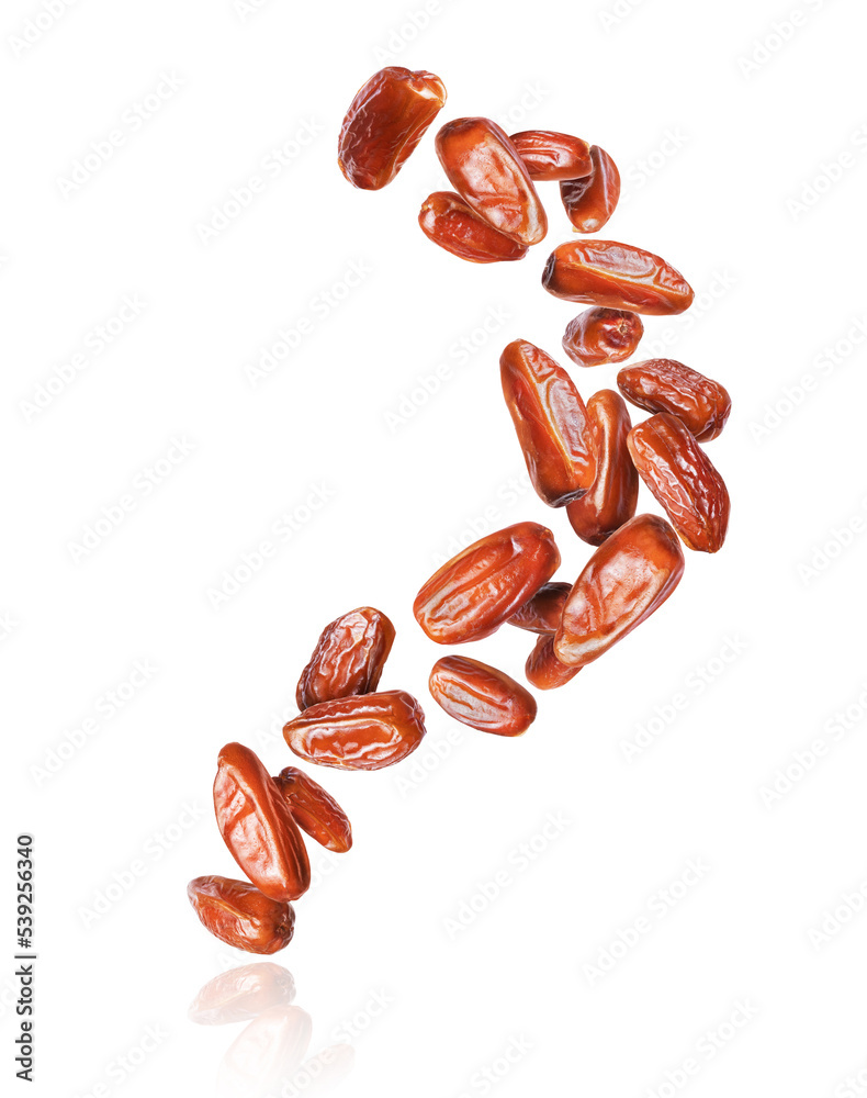 Tasty dried dates in the air closeup isolated on a white background