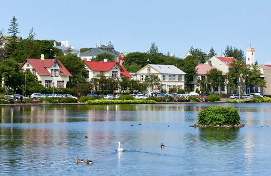Traditional Icelandic houses along the west side of the lake Tjörnin in downtown Reykjavik, Iceland.