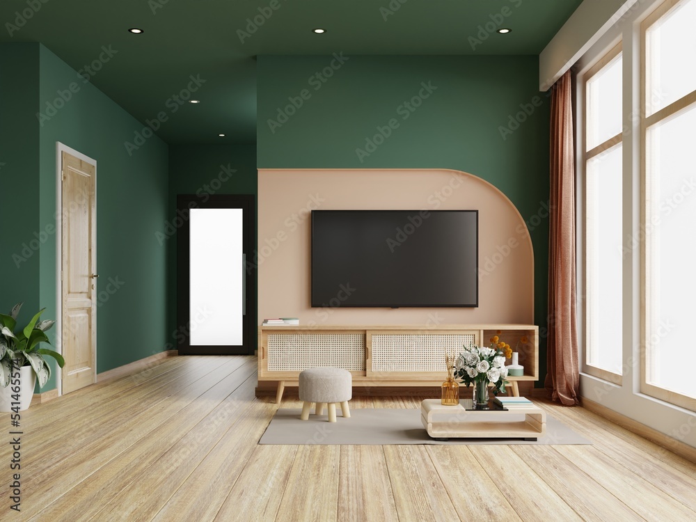 Living room with tv on cabinet in dark green color wall,minimalist muji style.
