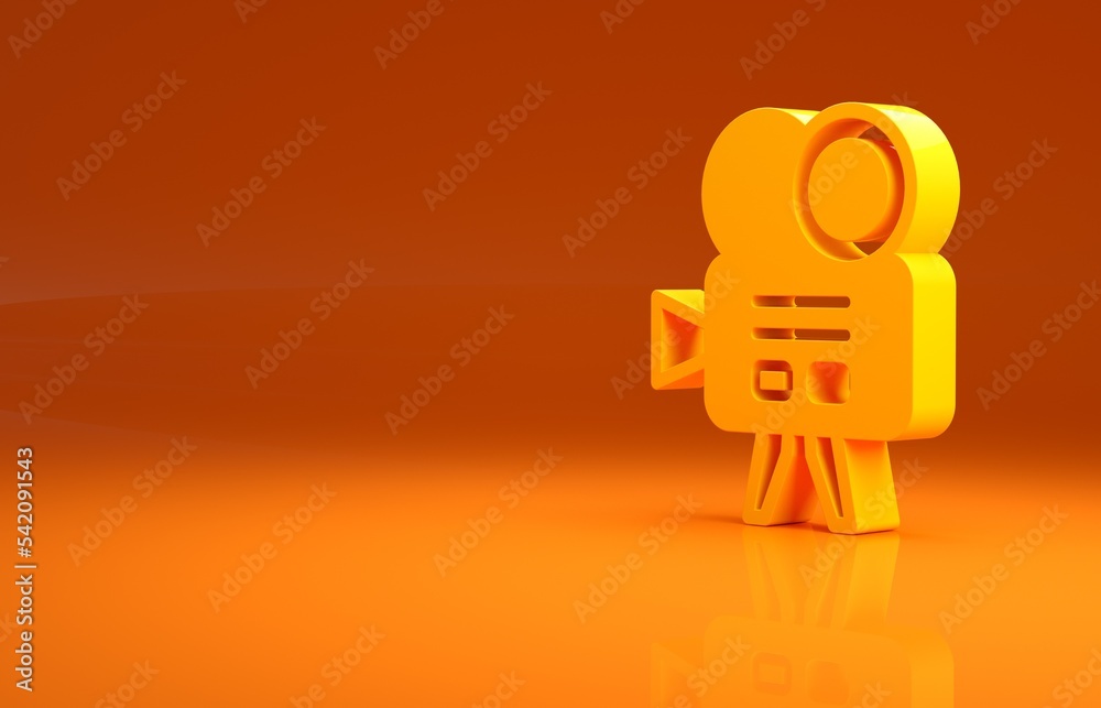 橙色背景上的黄色复古影院摄像机图标。摄像机。电影标志。电影项目