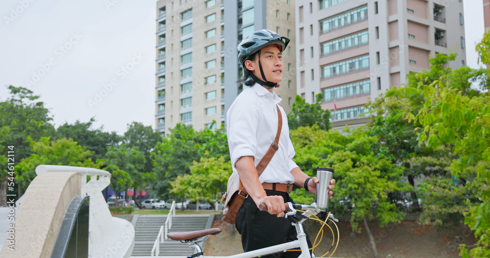 man using phone commuting